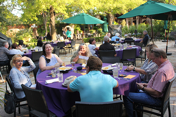 People connecting over dinner and drinks in Fort Worth